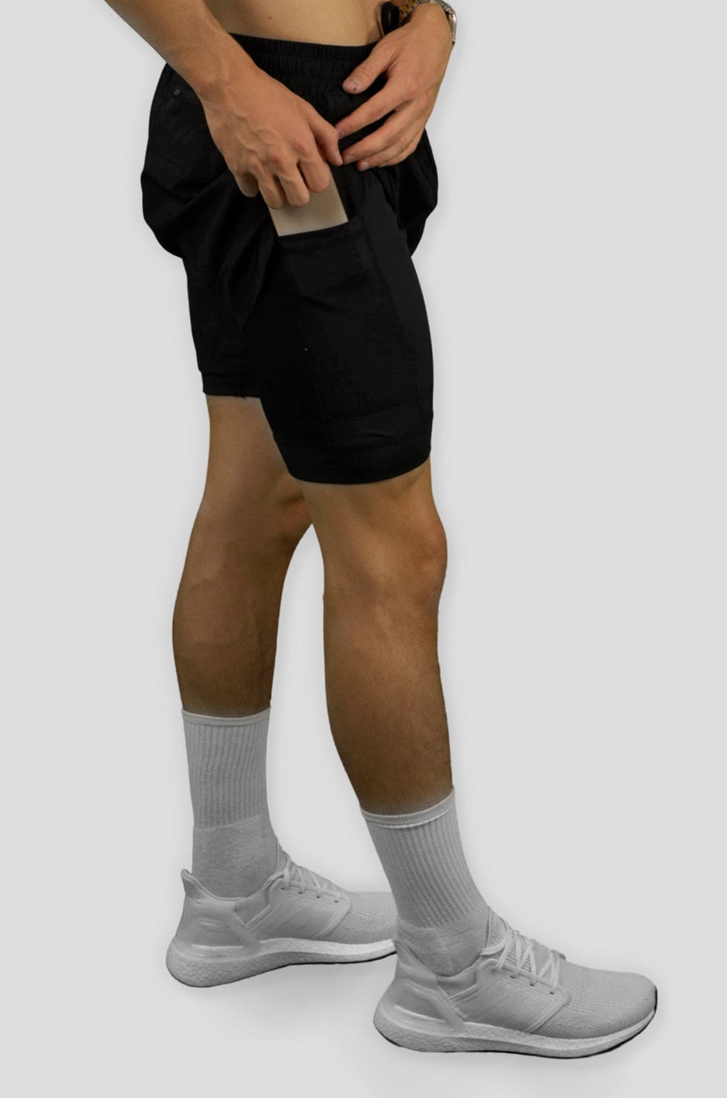 Snygga gymshorts med mobilficka